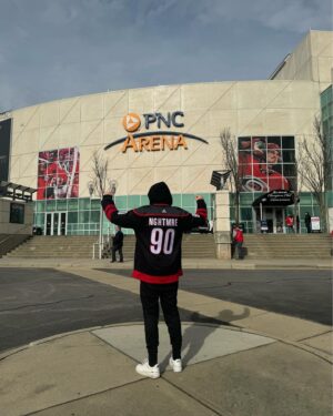 Tyler Marenyi Instagram - I grew up in Raleigh watching the @canes play. This year I was lucky enough to connect with them and they decided to use ‘intro’ and ‘threshold’ from my “DRMVRSE” album for their intro hype video. 

Yesterday I finally made it to a game and was honored to ring the siren to get the crowd hyped for the beginning of the 2nd period. 

Best of luck for the rest of the season!! @canes 🔮🌪️