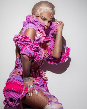 Vanessa Vanjie Mateo Instagram - 🧬 Atomiccccc Blondeeee 

On the mood board was Ri casted in the Fifth Element remake wearing the Miss Vanjie season 10 Barbie x Flower outfit reincarnated. Enigma lady who is fuckable but will pull her Glock 40 out of her yahoo and lay you out 🚬🔫🔬

Masterpiece created by @gregojakpe honored to have your work be  apart of ALL STARS 9 package ⭐️ 

Photography @marco_ovando 
Edited by @marioernun 
Hair by @hassoon_7 @wigsbyhassoon 

ALSO THIS RUNWAY RU TOLD ME I LOOKED LIKE @badgalriri so mission accomplished 🥲😎