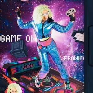 Veronica Green Instagram - My favourite things: Computer Games.

I’ve been a gamer most of my life. From the early days of the Amiga 500 then playing Ocarina of time on the N64 over and over again in the late 90’s. I owned a GameCube in uni and spent most of my time in the late 2000’s addicted to world of Warcraft and nowadays I spend my free time playing League of Legends.

This specific look was originally intended as a season two runway (Day at the seaside). The original concept centred around my college time living in Blackpool. I’d go down to the arcades EVERY DAY and play on the dance machines. The original design included a few different elements such as a reel of arcade tickets in the bumbag amongst other things. With very little money to pay for new runway looks I took a chance and decided to repurpose the look for the runway on season 3. Although it’s not my favorite look I’ve ever done I still enjoy it. 

#CyberChic #CyberChick

💇🏼‍♀️ @websterwigs and dressed by me
📷 @daveytyy 
📸 @alexcontefilms edit and retouching

With thanks to @pixs78 for assisting on the day