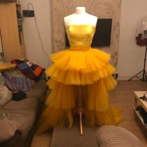 Veronica Green Instagram - Project ‘Ray of Sunshine’.

May 2020 was when I first started to feel like I was heading into a dark place & making this dress was an attempt to pull myself out. With no money to spare I managed to find the cheapest 2 bolts of tulle & leftover satin I had lying around the house, followed a YouTube tutorial & made a dress. My mannequin was oversized, yet too short and wonky. After making this dress I saved EVERY spare penny I had to get myself a proper mannequin to finally start making garments that fit properly. I’m so proud of my journey and to think I only started learning to sew SPECIFICALLY for drag race, makes me even more proud. I’m a novice that was judged like sewing was my craft. I truly faked it until I made it! 💚

💇🏼‍♀️ @emmarigby_pro 
👗 @veronicaqween