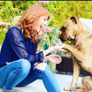 Wendy Braun Instagram - Home is where your dog is. Oh how I love our sweet rescue, Daisy. Happy National Puppy Day to all the dog lovers. And thanks to @wagsandwalks for all you do and for guiding us to her. We love being her forever home.  And the unconditional  love she pours on us daily is a treasure. The last pic was taken just this morning when we sat outside together to take in nature and listen to the birds. Paws up if you’re a dog lover.  Can you tell she’s listening too? 🐾❤️🙏 #HappyNationalPuppyDay