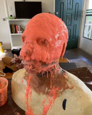 Wes Borland Instagram - This was the development process for the new stage look. From first sketch to sculpting and molding/casting/painting/grinding etc. @aliejoboxblock really helped me out on this one with pivoting to solve problems and come up with new solutions/ be a sounding board. I had the buffalo teeth to make the entire lower portion of the helmet but Japan and New Zealand have laws on importing animal products, so I cast 250 buffalo teeth out of resin which ended up being a plus because the material is lighter. The last photo is me repainting a new jacket today in Auckland because the fabric markers I used bled with sweat and were a complete fail. I don’t usually show the process this much but there have been questions about this one in particular so here ya go. Also shout out to @adelemildred for throwing me some advice from across the pond. Cheers!