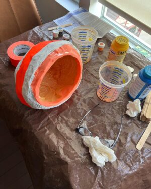 Wes Borland Instagram - This was the development process for the new stage look. From first sketch to sculpting and molding/casting/painting/grinding etc. @aliejoboxblock really helped me out on this one with pivoting to solve problems and come up with new solutions/ be a sounding board. I had the buffalo teeth to make the entire lower portion of the helmet but Japan and New Zealand have laws on importing animal products, so I cast 250 buffalo teeth out of resin which ended up being a plus because the material is lighter. The last photo is me repainting a new jacket today in Auckland because the fabric markers I used bled with sweat and were a complete fail. I don’t usually show the process this much but there have been questions about this one in particular so here ya go. Also shout out to @adelemildred for throwing me some advice from across the pond. Cheers!