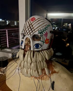 Wes Borland Instagram - This was the development process for the new stage look. From first sketch to sculpting and molding/casting/painting/grinding etc. @aliejoboxblock really helped me out on this one with pivoting to solve problems and come up with new solutions/ be a sounding board. I had the buffalo teeth to make the entire lower portion of the helmet but Japan and New Zealand have laws on importing animal products, so I cast 250 buffalo teeth out of resin which ended up being a plus because the material is lighter. The last photo is me repainting a new jacket today in Auckland because the fabric markers I used bled with sweat and were a complete fail. I don’t usually show the process this much but there have been questions about this one in particular so here ya go. Also shout out to @adelemildred for throwing me some advice from across the pond. Cheers!