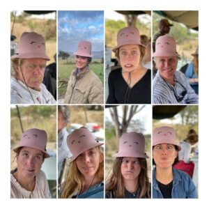 William H. Macy Instagram - We were at Sosian Lodge, a beautiful resort in the bush, at the end of our eleven day ride, and we were talking about how well our groups had gotten along. Some said the “Snippy Hat” was an influence but others weren’t sure. The Snippy Hat tradition started at the Atlantic Theater Company in New York back in the old days. At their endless company meetings someone would inevitably get pissed off and he or she would have to wear the “Snippy Hat” until they calmed down. In those days it was a kitchen colander. The current Snippy Hat is... well, I’ll post the pictures. But Snippy Hat or not, we got along like a house afire.
The trip was a combination of delights laced with tension. As previously noted, I’m new to horse back riding, so that was obviously on my mind and I know Ripley and Ellen felt the same. We took riding lessons, but still.... Interestingly, Moore and Kim were more worried about the campfires after dinner. My family notoriously loves games and we’re known to break into song at times. And Felicity is the ringleader and insists everyone plays and that’s what kept them up at night. We played a hilarious game called “In the Manner Of” which Daisy taught us, and it turned out that Ripley spent several weeks preparing “Mona Lisa and Mad Hatters” and she accompanied herself on the uke as she sang it to our family. (Not a dry eye in the house)
One evening, after a pretty long ride to our new camp, our guide Simon wanted us to take a bit of a hike. We drove out to a trail head and hiked the rest of the way to a large rocky hill. At a point we said “Okay, we’ve done this, let’s go back to camp”, but Simon urged us on saying the view would be worth it. What we didn’t know was that there was a drivable road on the other side of the hill and the staff had driven up earlier and set up a bar with hors d'oeuvres. That’s my kind of roughing it. We built a fire and stayed there until well after dark playing games and singing.