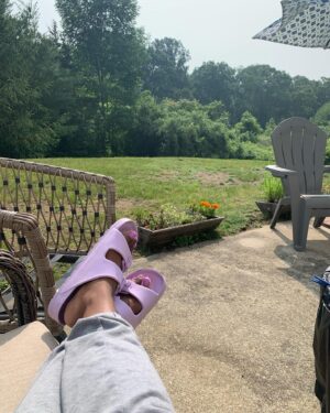Yaani King Mondschein Instagram - This is camping. 🪷🌿⛈️🔥☀️🏕️
My very first time ever.
.
.
1. Feet up before going camping
2. Our first fire of the trip brought to you by @amondschein 
3. Adam making us a quick snack with said fire 
4. Our home for 5 days
5. The pond at sunset by our site😌
6. The pond was nearly covered with these! 
7. Colorful fire magic 😉
8. New best friend 🐢
9. Rocks found on our walk to the end of the world 
10. What felt like the end of the world. The tide was so far out! 
.
Thank you @emhatami and @kamalhatami for sharing your anniversary with us! We had the best family time! And thank you Cape Cod for showing us who you really are.😜#HotWetAmericanSummer #ThatsWhatSheSaid