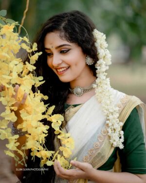 Yami Sona Instagram - Let vishu bring happiness and prosperity in your life 💛
 Happy vishu all 🥰

 📸 : @sujinsuvin