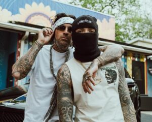 Yelawolf Instagram - for the record I’m the only sum’bitch bout to rock my lil bro’s chain @caskey … besides that he took care of his invoices !! hit @slumerican for all the new duds we’re rockin !!!! Caskey is here in Nashville dropping a new album coming out on SLUMERICAN !!!! @wlpwr myself and @mikedhartnett in here producing smashes !! next level shit !!!! LOVE YALL !!! 🎥 : @mikeoryanlane #slumerican 2024 !!