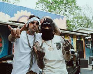 Yelawolf Instagram - for the record I’m the only sum’bitch bout to rock my lil bro’s chain @caskey … besides that he took care of his invoices !! hit @slumerican for all the new duds we’re rockin !!!! Caskey is here in Nashville dropping a new album coming out on SLUMERICAN !!!! @wlpwr myself and @mikedhartnett in here producing smashes !! next level shit !!!! LOVE YALL !!! 🎥 : @mikeoryanlane #slumerican 2024 !!