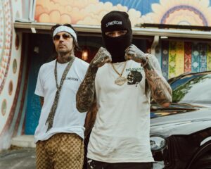 Yelawolf Instagram - for the record I’m the only sum’bitch bout to rock my lil bro’s chain @caskey … besides that he took care of his invoices !! hit @slumerican for all the new duds we’re rockin !!!! Caskey is here in Nashville dropping a new album coming out on SLUMERICAN !!!! @wlpwr myself and @mikedhartnett in here producing smashes !! next level shit !!!! LOVE YALL !!! 🎥 : @mikeoryanlane #slumerican 2024 !!