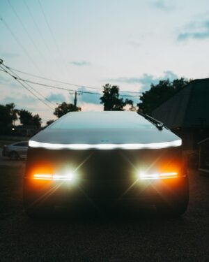 Yelawolf Instagram - sittin on the tail gate of a different kinda box these days .. @teslamotors Foundation Series Cyber Truck .. aye you can’t have War Story without a fighter jet in the drive way .. that black on black SLUMERICAN stealth bomber … I named her Temples Chariot !!!! CARS CARS FANCY CARS !!!! 🎥 @visualsbytyre #slumerican #tesla #cybertruck