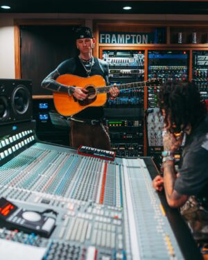 Yelawolf Instagram - rad day in the neighborhood .. caught up with my dawg’ @machinegunkelly and slipped into a writing session with him and @jellyroll615 .. ended up back at the @slumerican house at @eastirisstudios jammin .. @cfn_dawayoflife @twolanejames @jtloux @caskey in the GNG !!! 🎥 : @visualsbytyre #slumerican !!!!