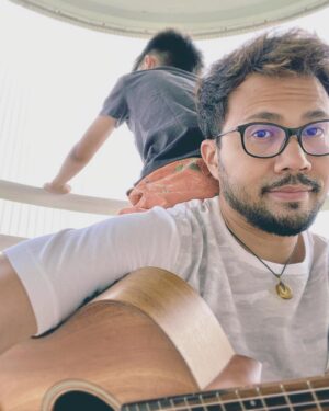 Zenn Kyi Instagram - I got my IG account back! 😊
And I just took this picture with the monkey on my back. I’m working on a new song and he came and comfortably sat on me like I’m a chair person for him. 🙄😅