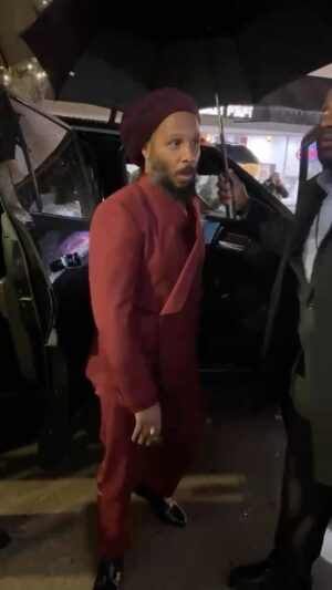 Ziggy Marley Instagram - Hold on! The manager needs an umbrella!
The moment I realized Isaiah wasn’t getting that first class treatment ! 🤨😂😂😂
 No matter how big the occasion or your status in life. Remember your real job and never lose focus of it. JAH 
📍#bobmarley @onelovemovie premiere
#losangeles 
🚙 @rivianofficial