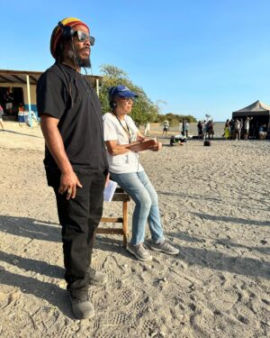 Ziggy Marley Instagram - Fae Ellington CD, OD ( Order of Distinction Officer Class , Order of Distinction Commander Class ) On the @onelovemovie set in #Jamaica 🇯🇲
I want to give a hug of gratitude and thanks to our sister, friend, mother figure , god mother, aunty dialect coach, Patois language authority, historian our 🇯🇲 national treasure a great example of a human being , the beloved and treasured @fae.ellington 
affectionately know as ‘ Aunty Fae’ on set and off . I can say so much about this woman and every Jamaican who worked with us on the film know what I’m talking about. I use to hear her on the radio when i was going to school “ On the Morning ride”

We love you Fae and thank you for your guidance , energy, work ethic, knowledge, persistence and presence. JAH
#bobmarley bobmarley #onelove #bobmarleymovie #onelovemovie #bobmarley