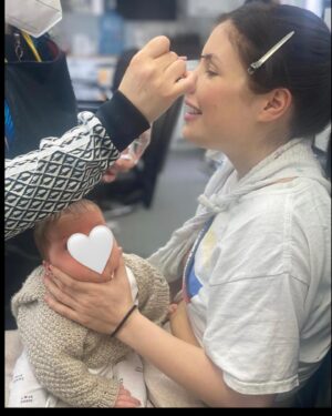 Aimee Kelly Instagram - I went back to work 3 weeks after giving birth to my son. Here we are sleep deprived, nursing and trying our best at figuring this thing out. It is the most exhausting, challenging and rewarding thing I have ever done but it really does take a village. Thank you @amyhubcast for championing an 8 month pregnant woman, my agents for viewing motherhood as a superpower rather than a hinderance and the ace production for accommodating feeding a newborn in the hair and makeup chair at 5am🤪 (and bringing me extra sides with every meal😈 @zoemelissax 
My experience isn’t what all woman are granted but I’d like to think we are normalising new parents retuning to work and taking more steps in the right direction.

Special shoutout to bibs for helping looking after our bean🤍and @jessybarden who on my 5th day of postpartum baby blues hormone crash (if u know u know)FaceTimed me from across the Atlantic Ocean with a pep talk and peeled me off the floor. There is an unspoken sisterhood with woman who have walked the road before you and I’ll never forget when it’s my turn to be the advice giver- all whilst being knee deep in newborn poop of course🤍 There was a time when I really doubted myself and thought I wasn’t going to be able to do it but then I read @sophiesophierundle post on going back to work with her baby and it made me feel less alone. Here’s hoping someone in the same position reads this and see’s although it’s not easy, it is doable and we got this👊🏼