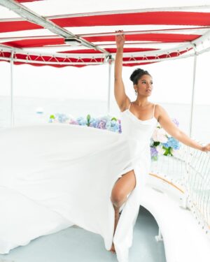 Alana Monteiro Instagram - Free 🦢 

P.S the tan lines on my feet are from @birkenstock sandals 😜

Concept/Design: @sarueeventdesign
Venue: @chanticleernantucket
Boat: @nantucketbywater
Photography: @britperkins_
Videography: @sofiya.luna.weddings
Floral Design: @_buds
Tabletop Rentals: @curated_rentals 
Furniture Rentals: @dez.collective
Linens: @nuagedesignsinc
Styling: @juliematosstyle
Makeup Artistry: @bombchellebeautymua / @bridalbeautybymadelyne
Hair Styling: @saraibyday
Dress Designer: @bremelia
Jewelry: @capeology
Jewelry: @thediamonddoornantucket
Grazing Table: @grazingcapecod
Cake: @loveand.flour
Custom Cookies: @sweettreatsbymariarose
Stationery: @maxandmaidenink
Calligraphy: @bl_calligraphy
Cocktails: @thewanderingbartender_ 
Bridal Model: @alanamonteiro_ / @modelclubinc
Groom Model: @connorweathers22
Bridal Model: @mackenzie.lillian88
Groom Model: @ivan_georgiev3