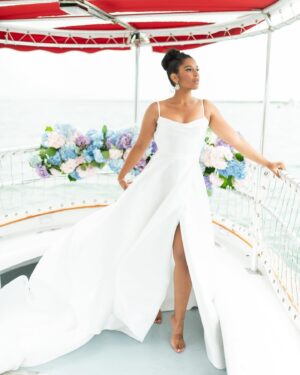 Alana Monteiro Instagram - Free 🦢 

P.S the tan lines on my feet are from @birkenstock sandals 😜

Concept/Design: @sarueeventdesign
Venue: @chanticleernantucket
Boat: @nantucketbywater
Photography: @britperkins_
Videography: @sofiya.luna.weddings
Floral Design: @_buds
Tabletop Rentals: @curated_rentals 
Furniture Rentals: @dez.collective
Linens: @nuagedesignsinc
Styling: @juliematosstyle
Makeup Artistry: @bombchellebeautymua / @bridalbeautybymadelyne
Hair Styling: @saraibyday
Dress Designer: @bremelia
Jewelry: @capeology
Jewelry: @thediamonddoornantucket
Grazing Table: @grazingcapecod
Cake: @loveand.flour
Custom Cookies: @sweettreatsbymariarose
Stationery: @maxandmaidenink
Calligraphy: @bl_calligraphy
Cocktails: @thewanderingbartender_ 
Bridal Model: @alanamonteiro_ / @modelclubinc
Groom Model: @connorweathers22
Bridal Model: @mackenzie.lillian88
Groom Model: @ivan_georgiev3