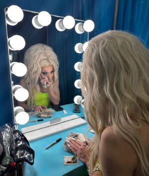 Alaska Thunderfuck Instagram - I had an incredible time at @rupaulsdragcon this weekend; reuniting with so many of my sisters, pushing the casual apparel agenda and meeting so many of you 💚🩷

I would like to take a moment to express my gratitude to everyone who worked in the clouds at our booth, making it such an enjoyable experience 🩵☁️ 💙

These beautiful gowns were made by @michaelbrambila and my hair on day one was crafted by the amazingly talented @billylamour with flowers that I painted 🌺