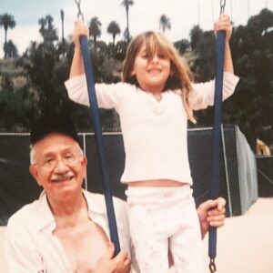 Aleen Keshishian Instagram - My father died 4 years ago today. A while ago, I asked for a sign from the other side to let me know he is still with me and watching over me and my family. I remembered this amazing day at the beach when my kids were young and my dad was pushing them on the swing-set in the sand. I always loved this picture because he and my daughter were so happy. So I asked for him to send me a sign - a swing-set on sand. A few months later, a friend texted me this picture and said it had showed up on her phone and she had never seen it before! It was not only the sign I asked for, it was the EXACT picture which inspired the sign!  My friend @lauralynnejackson wrote an incredible book called Signs (which I highly recommend) & she talks about how we can communicate with our loved ones on the other side. I am a true believer now!  My dad is for sure beaming with joy that his communication got through!  I love you dad forever and ever. ♥️