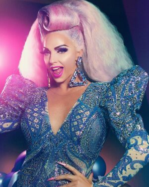 Alyssa Edwards Instagram - Have You Ever Lassoed the moon & the stars and pulled that rope tight? 🤠 🌙 ⭐️🦄 Dreaming Wide Awake while rewatching AGAIN #DancingQueen @netflix 🌈💃🏼 I Love My Life & ALL The Folks In It ❤️ 📸: @mattmonathphoto 
Hair: @in2gr8ion 
Published: @outmagazine 👗: @eddie.couture @katherinefashiondesign 💎: @lollicox_roxbycox 🎈 : Kelly @joeyrivers86.  #rupaulsdragcon