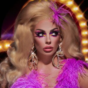 Alyssa Edwards Instagram - The world is a kaleidoscope of colors, let’s LIGHT it up✨

@anastasiabeverlyhills 
I 💜 This LEWK painted by the gawdesss @alyssamarieartistry 👗: @cazias 
#ABHxAlyssaEdwards 
#DancingQueen #Beauty #anastasiabeverlyhills #makeup #Drag
