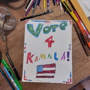 Amanda Palmer Instagram - Vote 4 Kamala. By Ash, age 8. 

We stayed up super late to watch the closing speeches of the DNC the other night. 

Ash was so tired he fell asleep during @kamalaharris’ speech, but he was transfixed by the speakers, especially the republican calling Trump a “weak” man, a statement Ash really fixated on, and starting asking about. Why?

I explained Trump’s childhood trauma and his need for control and power at all costs because of his mangled heart and fear-based attitude towards life. 

Ash asked if he could vote. 

We explained how it works. He was mad he couldn’t vote.

Then he asked what he COULD do. I told him he could try to convince adults to vote. So he asked if he could make a poster and hang it around town. My heart exploded that he thought of this himself. He knows how it’s done. 

He spent an hour yesterday drafting and designing this poster while I figured out where we could get some color copies made. 

This kid wants you to vote. 

Please vote. 

If you aren’t sure you’re registered or need guidance, go to @headcountorg. They’ll help you. 

Everybody. Please. Vote. 

♥️🔥🌈💜🇺🇸🎯🎉🎹🫡