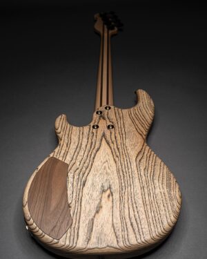 Amos Heller Instagram - “It’s absolutely beautiful...completely unlike anything I’ve played before, and it sits beautifully in the hands." - Yamaha artist Amos Heller (@amosjheller ) on his custom Yamaha BB. 

Click the link in the bio to learn all about it on the #YamahaGuitarDevelopment blog.
https://yamahaguitardevelopment.com/2023/10/26/yamaha-guitar-development-custom-shop-amos-heller/
