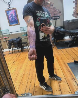 Amos Heller Instagram - Absolutely thrilled with this piece by @erictattoojordan at @skincitytattoodublin 

He was great to work with throughout the process, and his attention to detail is apparent. The whole shop is an absolute vibe and the 90’s hip hop soundtrack was a welcome distraction. Go see him! 

Thank you Eric for your work and creativity on this piece which was designed with and is a tribute to my beloved @karahheller 

(Thanks for watching the kids solo in Dublin for 5 HOURS)