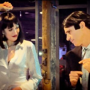 Amy Corbett Instagram - This week, I’m taking you behind the scenes of our epic LEGO Design Team 90s party! Jamie and I went as a double act…Mia & Vincent from Pulp Fiction. Such a fun night with the best colleagues. 🎉 Of course, we didn’t take enough pics…but I guess that’s always the sign of a good night. How do you think we did? Slide right to see the real movie pic 🍿 
.
.
.
#pulpfiction #costume #miaandvincent #cosplay #party #legoparty