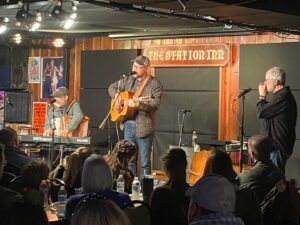 Andrew Peterson Instagram - Jamie and I went to see Buddy Greene, Jeff Taylor, @ronblockakus, and a whole heap of their friends at the legendary @stationinnnashville this week, and it was yet another occasion to give thanks for the amazing community here. Nowhere else in the world can you watch a a world class bluegrass, folk, Irish, classical, jazz jam that includes raucous laughter and theological jokes. They let me sing “Everybody’s Got a Song,” and if it’s the only time I ever get to play on that stage, it was enough.