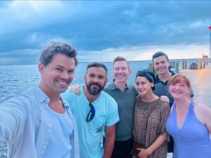 Andrew Rannells Instagram - It’s been a fun week in Fire Island, my 23rd summer coming out here. While the activities have changed over the years, the friends have stayed the same. And I’m still hoping the girls working at The Pines Pantry think I’m cool.