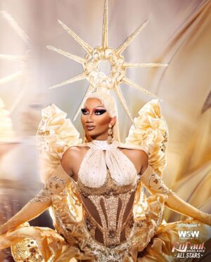 Angeria Paris VanMicheals Instagram - I’ve had so many people ask who is responsible for my gown and hair for the #allstars9 promo!! The gown was designed and constructed by the incredibly talented @howiebofficial and the hair was sculpted by the amazing @hair_by_koji_ichikawa!! The inspiration behind this look was goddess of light 🌟💫 daughter of the sun 🌞 and they both helped me achieve exactly that!!