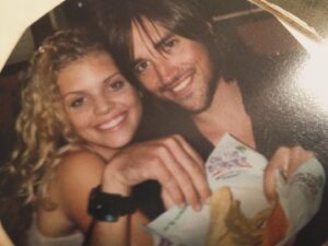 AnnaLynne McCord Instagram - I’m absolutely heartbroken, but I’m feeling a little bit more myself, today. I just have to tell the world what a light you were in my life. I can’t believe you’re really gone. This is Nathan Alan Standish. My first love. He is with the angels, now. — it was 2004, we did that photo shoot with my sisters down near South Pointe. We had been there for a few hours and I needed to refill the meters. We went together. I was a smitten kitten, but then we reached the parking lot. The sun was warm, the wind was coming off the point where all the big liners enter the harbor. I’m not sure what made you do it, but without a word, you reached over and laced your fingers with mine. I was beside myself, “What does this mean? Oh my god. He’s holding my hand!” It meant it wasn’t just me. It meant you felt it to. It meant you would be mine for the next four years, and that I would love you for the rest of my life. Yours is gone too soon, but I feel you when the tears won’t stop. I know you’re resting now. I know you’re finally at peace. I love you, Nathan Alan Standish. Thank you for changing my whole life by choosing me and being my first love. ❤️