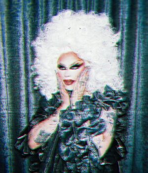 Anubis Finch Instagram - Do the curtains match the dress? 👀 

🪙 fit by @malonfashion 
👩🏼‍🦳 hair by @baehmbaehmwigs 
📷 photos by @tianadaze 
nails/mug by me

#ANUBIS #fashion #silver #chrome #drag #dragrace #dragqueen #queen #dragraceuk #makeup #barbie #vampire