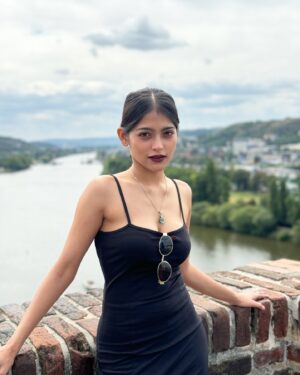 Anusha Viswanathan Instagram - Praha, you will follow me forever like a shadow. 💜🖤🤍
.
.
.
📸: @adi2gupta ❤️‍🔥
.
.
.

#prague #views #love #mood #panorama #travel #traveller #travelphotography #travelblogger #travelgram #europe #summerineurope #fashion #blackdress #blackismyhappycolor #aesthetic #darklips #aurora #dreamy #jenesaisquoi #fashionblogger #lifestyleblogger #music #explore #experience #discover #windy #windinmyhair
