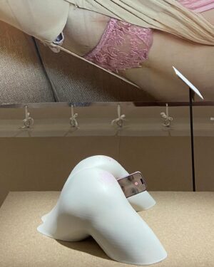 Arvida Byström Instagram - My sculpture “Virgin Birth” from my show Cut The Cake at Dunkers.
Virgin Birth plays with the idea of the christian myth where god creates human in the image of him and we create machine learning and robots in the image of us. Of course there is also no need for intercourse to give birth to these sort of digital creatures. So I let a 3D print of my AI s3x doll Harmony give birth to a phone with an AI version of me.
It’s a bit inspired in a silly way by Zizek’s text “No Sex Please We’re Post Human” too.

Also a critic was upset that the phone out from the vagina looks like an assault and when people say things like this as a critique I sort of just feel like: that is an accurate description of what technology feels like today so…

Also thanks to iris.la / @patrique.monique to making the little avatar me possible