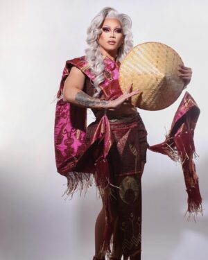 Aura Mayari Instagram - My rip her to shreds look is inspired by Filipino tribes and symbolizes my life I had in the Philippines. Filipinos are the most happy people in the world, despite not having much.

The shreds on this look symbolizes my family’s struggles with poverty and the bright color is our happiness and content with our life. We were happy even with nothing.

👗 @hausofcurio 
💇‍♀️ @gorak_eldar 
📸 @ericrichardmagnussen