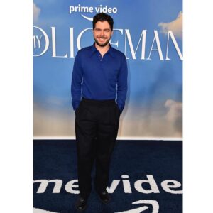 Ben Lewis Instagram - I begged and scraped my way onto a Harry Styles red carpet, so yeah, I’m posting to main. 💙

Thanks for having me @primevideo @amazonstudios @kzore & shout out to my purse-holding policewoman @kristenzublin #MyPoliceman