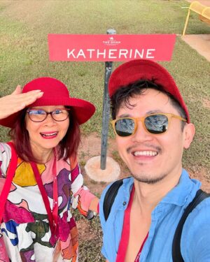 Benjamin Law Instagram - Ticking off an all-time bucket list item for Mum’s 70th birthday … BY TAKING HER ON THE FRICKIN’ GHAN. 
 Feeling damn lucky to travel close to 3000km through the heart of the continent on such an iconic railway, starting in Adelaide on Kaurna Country, then chasing sunrise at Marla on Anangu Pitjantjatjara Yankunytjatjara Land, having stunning off-train nature experiences at Mparntwe (Alice Springs) and Katherine on Jawoyn Country, before finally pulling into Darwin on lush Larrakia Country. 

It’s wild. You honestly can’t quite comprehend the scale of Australia until you experience it like this. 

But what was really staggering for this daughter of a restaurateur (Mum) and son of a restaurateur (me) was the all-inclusive* wine list and menu of fine-dining quality local fare (think: crocodile dumplings, local barramundi, buffalo massaman curry, mango parfait) they served up every day. We’re still processing how these peeps make food this good on a moving vehicle. 

Shout out to the entire Ghan crew who gave us the Gold Service (literally) treatment, especially Yohan, Rami, Darlene, Ralph and Imogen for taking extra special care of Mum. 

And massive thanks to the utter legends at @journeybeyondrail for making a lifelong dream of Mum’s come true. 

If you’re considering one of their iconic trips between Adelaide and Darwin (The Ghan), Sydney and Perth (Indian Pacific), Brisbane and Adelaide (Great Southern) or Adelaide and Melbourne (The Overland), follow them on Insta for inspiration and travel porn. 

Can’t recommend it enough. 

Oh, and happy birthday to the Ghan too. Lookin’ good for a gal who’s just turned 95.

*N.B. “All-inclusive” is now my safe word. 

#journeybeyondrail #theghan #australiabytrain #gifted