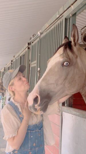 Beth Behrs Instagram - When you've been gone for a month, but your incredible trainer @dressagecanbefun stumbles upon a UNICORN of a horse for you... it's like Christmas morning when you finally meet him in person. Welcome to the family TRU BLU. A half Arabian / Half Quarter Horse #dressage horse of my dreams. I finally get to join the @arabianhorseassoc and go to Arab shows with my girls @sydneyanne_dressagelife @andsewitgrows ! #arabianhorse #dressagehorse #equestrian #equestrianlife #equestrianstyle #horse #dreamhorse 💙🩵💙🩵 @kasteldenmark #horsegirl