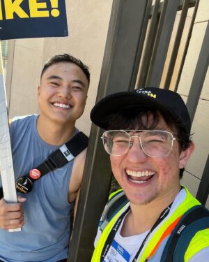Bex Taylor-Klaus Instagram - OMG OMG I MET @ileosheng (finally!!) ON THE PICKET LINES OF WB TODAY 😍😍😍😍😍

he’s so awesome 🤩 can’t believe he let me get a selfie! 

oh also i got upgraded to captain 🫡 #sagaftra #sagaftrastrike #sagaftrastrong
