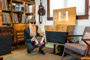 Billy Gibbons Instagram - Got to do my Vanna White impression on a visit to the home of Streamline HiFi.  Digging the vinyl line up above as well as these sensational stereo consoles.  The big one on the left is called The Mojo and the one playing Rio Grande Mud is The Crossroads. “Francine” approved!  More “blues you can use” at streamlinehifi.com (link in bio)