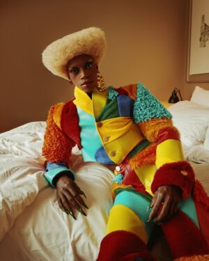 Black Peppa Instagram - BTS shots before heading to @frolovheart SHOW. Thank you @thelondoner 💖

LFW- LOOK 4- Wearing custom @christopherniari to attend the @frolovheart SHOW. Had this concepts for months where I’d use various fabrics with different textures particularly bathroom rugs, felt, suede, faux leathers and furs to create a groovy tailored high waisted pants suit. For this LFW it was also my priority to showcase more black hair styles and desired to style a blonde Afro myself. This was the first time I’ve styled any wig and was quite proud of the end result I must say.

Photographer: @kimlangstudio 
MUA: @jackoliverx using @theunseenbeauty 
Full look: @christopherniari 
Hair by me
Earrings: @nobasicbombshell
Money Nails by @nailsanthonys