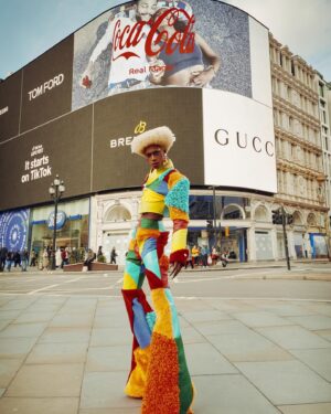 Black Peppa Instagram - “Won’t you take me to Funkytown?”

LFW- LOOK 4- Wearing custom @christopherniari to attend the @frolovheart SHOW. Had this concepts for months where I’d use various fabrics with different textures particularly bathroom rugs, felt, suede, faux leathers and furs to create a groovy tailored high waisted pants suit. For this LFW it was also my priority to showcase more black hair styles and desired to style a blonde Afro myself. This was the first time I’ve styled any wig and was quite proud of the end result I must say.

Photographer: @kimlangstudio 
MUA: @jackoliverx using @theunseenbeauty 
Full look: @christopherniari 
Hair by me
Earrings: @nobasicbombshell
Money Nails by @nailsanthonys