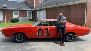 Brandon Quinn Instagram - I was obsessed with ‘The Dukes of Hazzard’ when I was a kid. I loved that show. So much so, I had my mom make me a ‘Dukes of Hazzard’ cake for my 10th birthday (I tried to find the picture but sadly no luck). Needless to say, when this relic rolled by as we were filming, it was a nostalgic show stopper… It also happens to be one of the few remaining General Lee’s out there and is signed by the entire cast and several of the directors from the show.  The owner was kind enough to give me the cars history and let me commandeer his ride for a moment ❤️