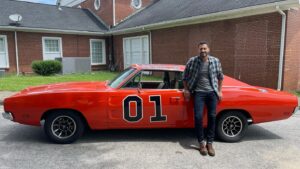 Brandon Quinn Instagram - I was obsessed with ‘The Dukes of Hazzard’ when I was a kid. I loved that show. So much so, I had my mom make me a ‘Dukes of Hazzard’ cake for my 10th birthday (I tried to find the picture but sadly no luck). Needless to say, when this relic rolled by as we were filming, it was a nostalgic show stopper… It also happens to be one of the few remaining General Lee’s out there and is signed by the entire cast and several of the directors from the show.  The owner was kind enough to give me the cars history and let me commandeer his ride for a moment ❤️