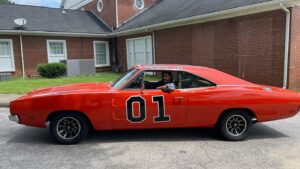 Brandon Quinn Instagram - I was obsessed with ‘The Dukes of Hazzard’ when I was a kid. I loved that show. So much so, I had my mom make me a ‘Dukes of Hazzard’ cake for my 10th birthday (I tried to find the picture but sadly no luck). Needless to say, when this relic rolled by as we were filming, it was a nostalgic show stopper… It also happens to be one of the few remaining General Lee’s out there and is signed by the entire cast and several of the directors from the show.  The owner was kind enough to give me the cars history and let me commandeer his ride for a moment ❤️