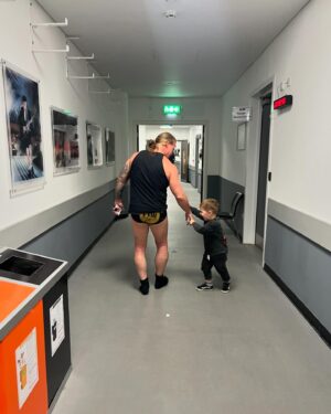 Brie Garcia Instagram - Last night was really magical for our family!! It was Buddy’s first time to watch Bryan wrestle live. It’s no secret Bryan’s destination and how his journey is slowly coming to an end.  He has this beautiful way about him that draws you in and makes you smile. You can feel his authenticity and how pure his soul is. I couldn’t be more proud to sit ringside with our kids and watch him fulfill everything he’s always wanted. Love you Bryan and so happy our children got to see their Daddy walk out a champion!!