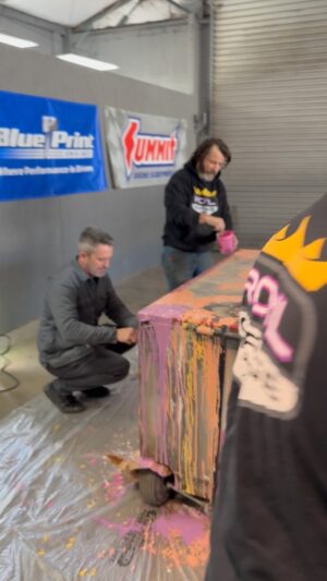 Bryan Fuller Instagram - The @roylgarage crew took 10 minutes to put the leftover @revoltautopaint out of my #sataspraygun on the  aluminum #pitboxes mobile I’ve used for years.  This was the first fake #patina I did with Shay she showed me the ropes on how to make a new box look old.  That was probably 15 years ago and it needed a facelift.  Hell, why not drip the paint from each of the 10 #cars we build for deserving recipients as #art!  Loving the #80s colors over the #rust.  This beast needs a Bluetooth @kickeraudio system in it!!! Really anxious to see how the episodes get edited my @courtney_hansen and team for @motortrend.  keep an eye out later this year for airdates!  #rideofyourlife #courtneyhansen #roylgarage #motortrend #blueprintengines #summitracing #kickeraudio #sata #satabydanam #evercoat #lincolnelectric #fullermoto #dynamat #mooreandgiles #paintshop #custompaint